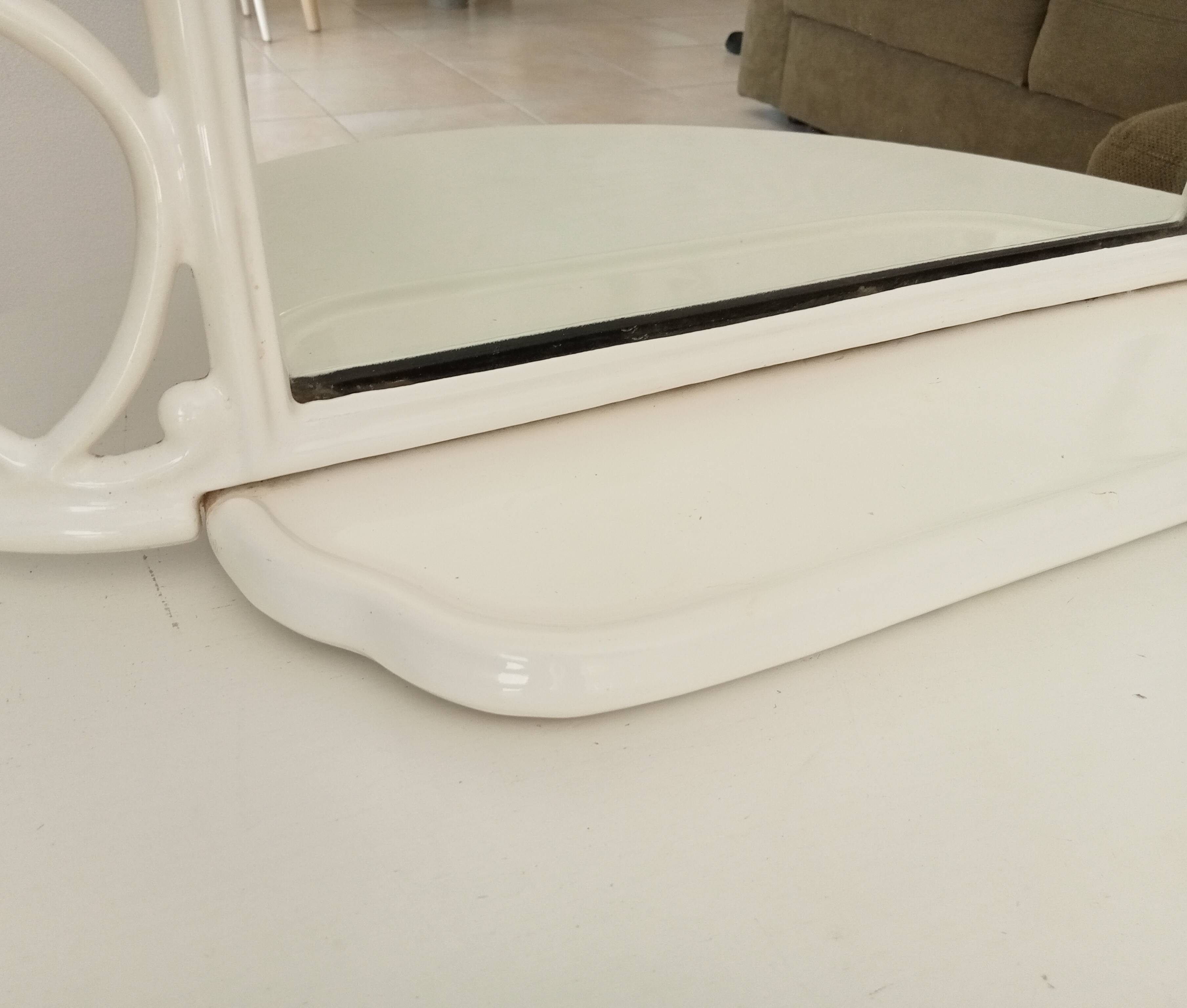 Antique 1930s enamelled cast iron shelf mirror