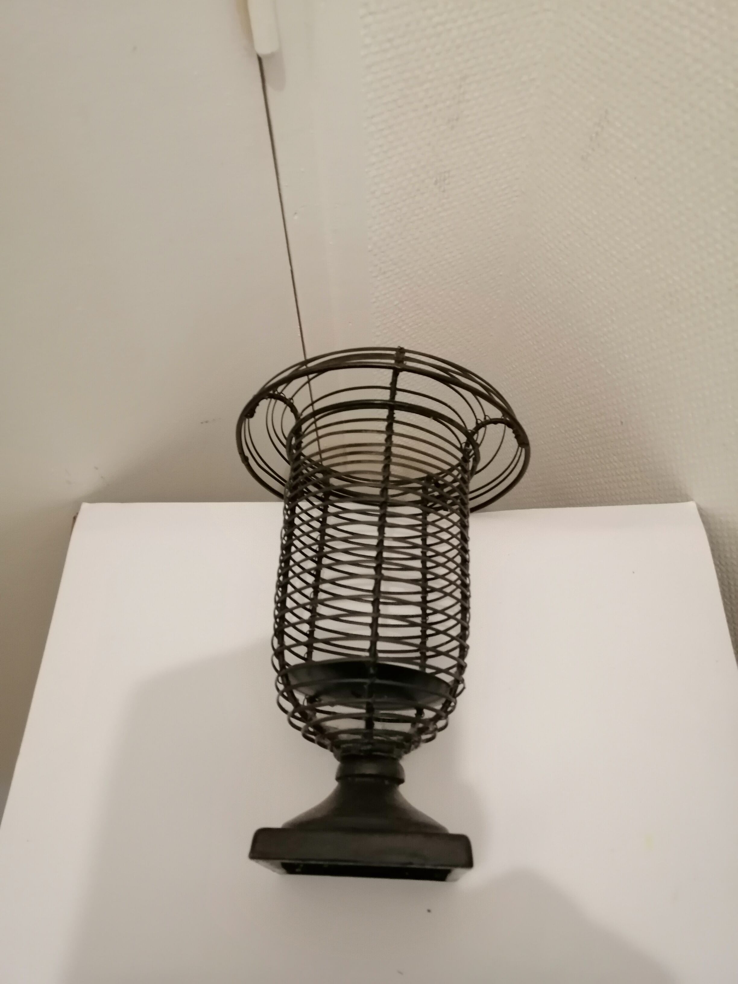 Wrought iron candle holder