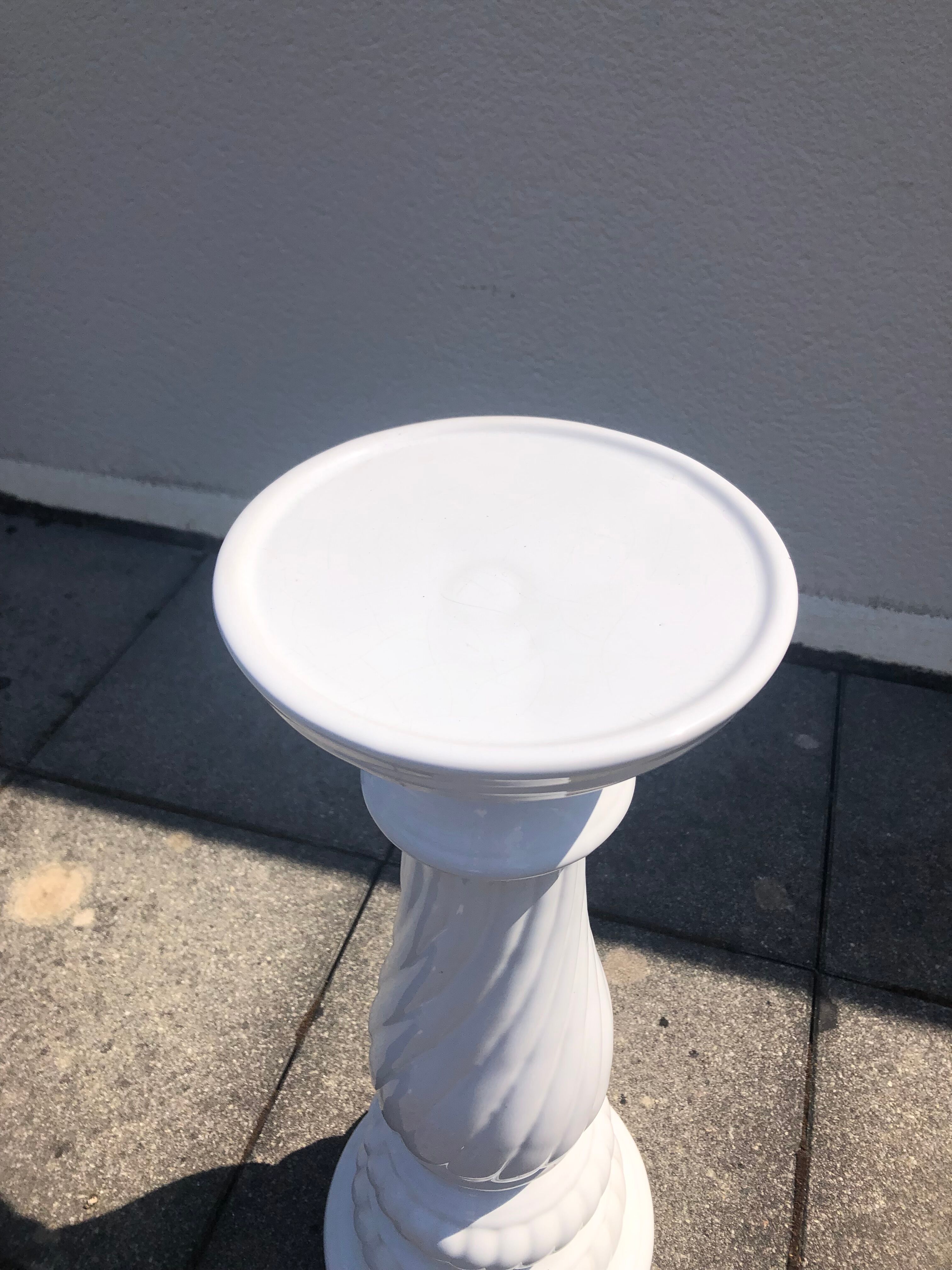 Column and white earthenware pot cover