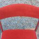 Pair of designer chairs in chrome metal and orange velvet from the 1970s.