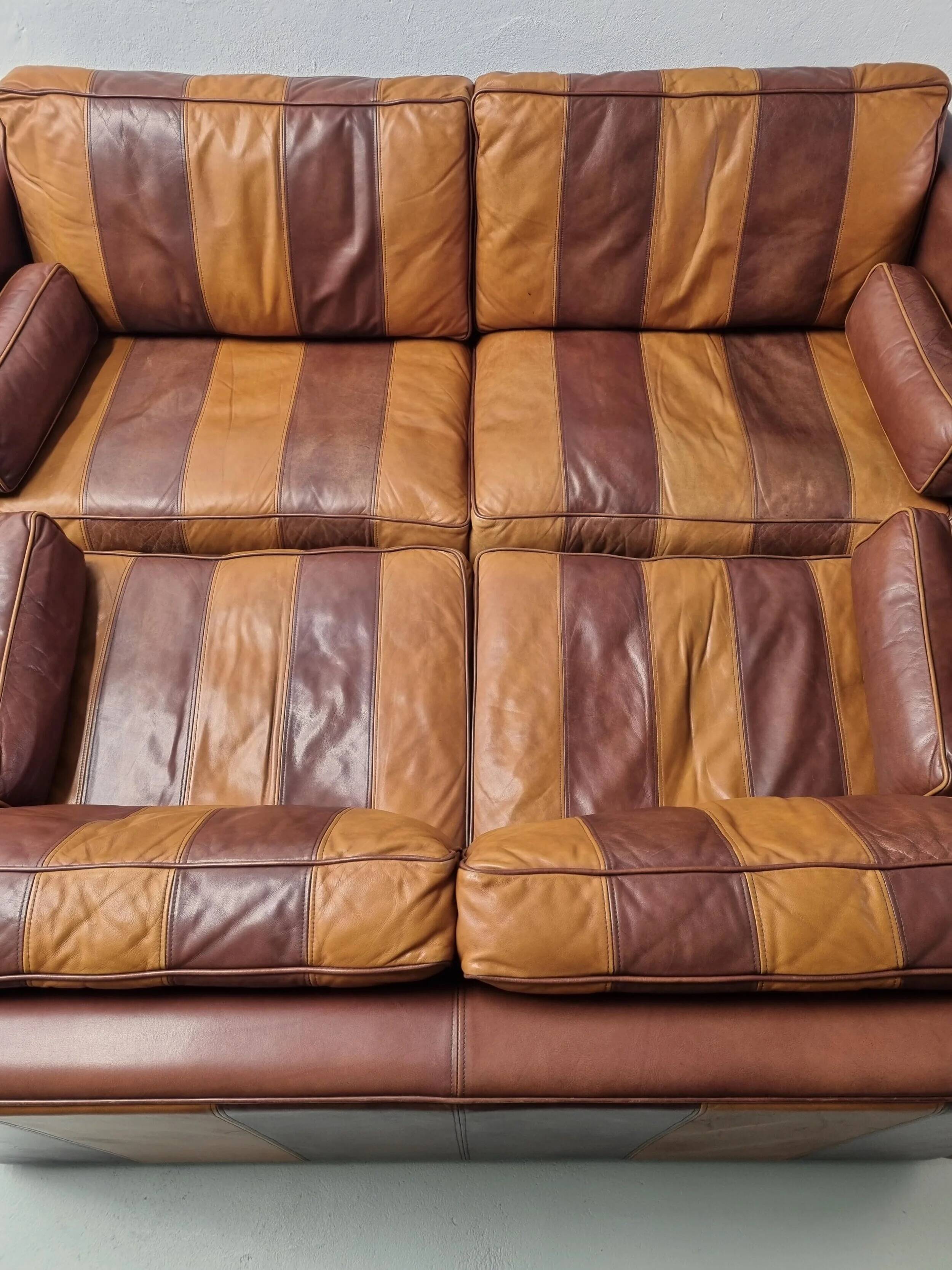 Vintage striped brown orange leather sofa (210 cm x 88 cm)