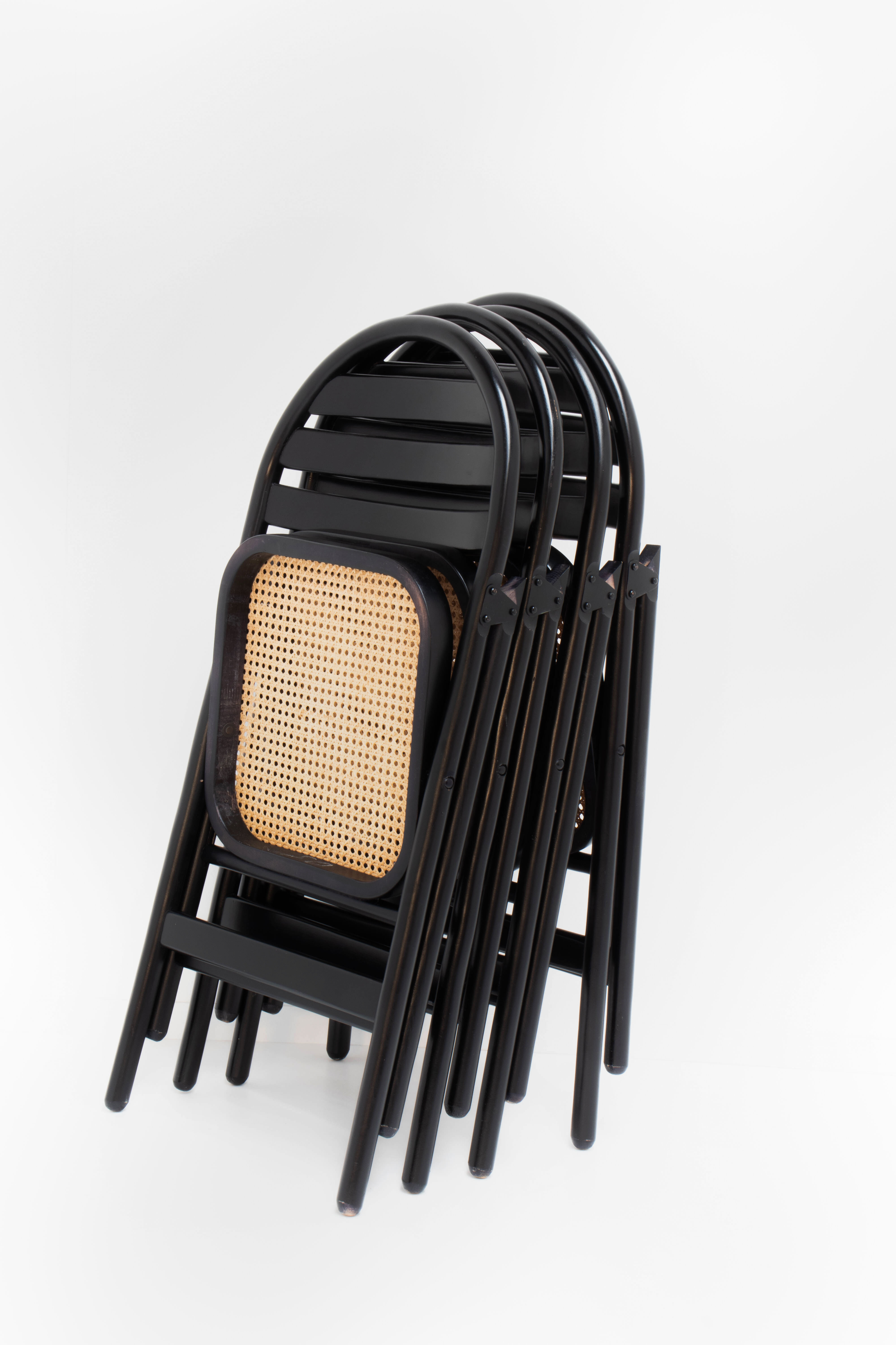 4 vintage wood folding chairs with cane seating