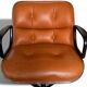 President armchair in leather by Charles Pollock