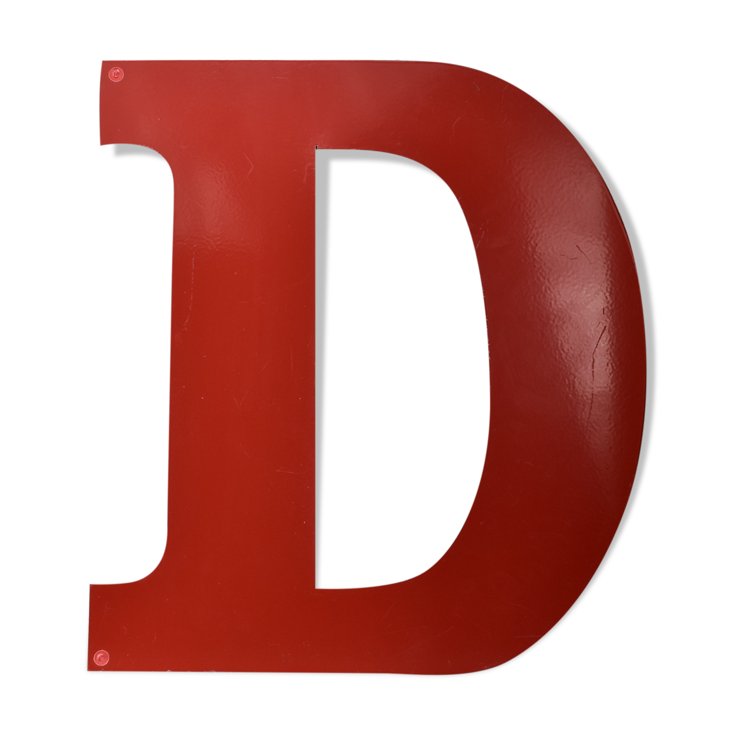 industrial letter "D" in red metal