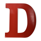 industrial letter "D" in red metal