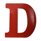industrial letter "D" in red metal
