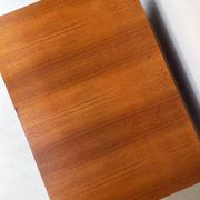 Coffee table with brown corduroy fabric, wooden top and chrome legs