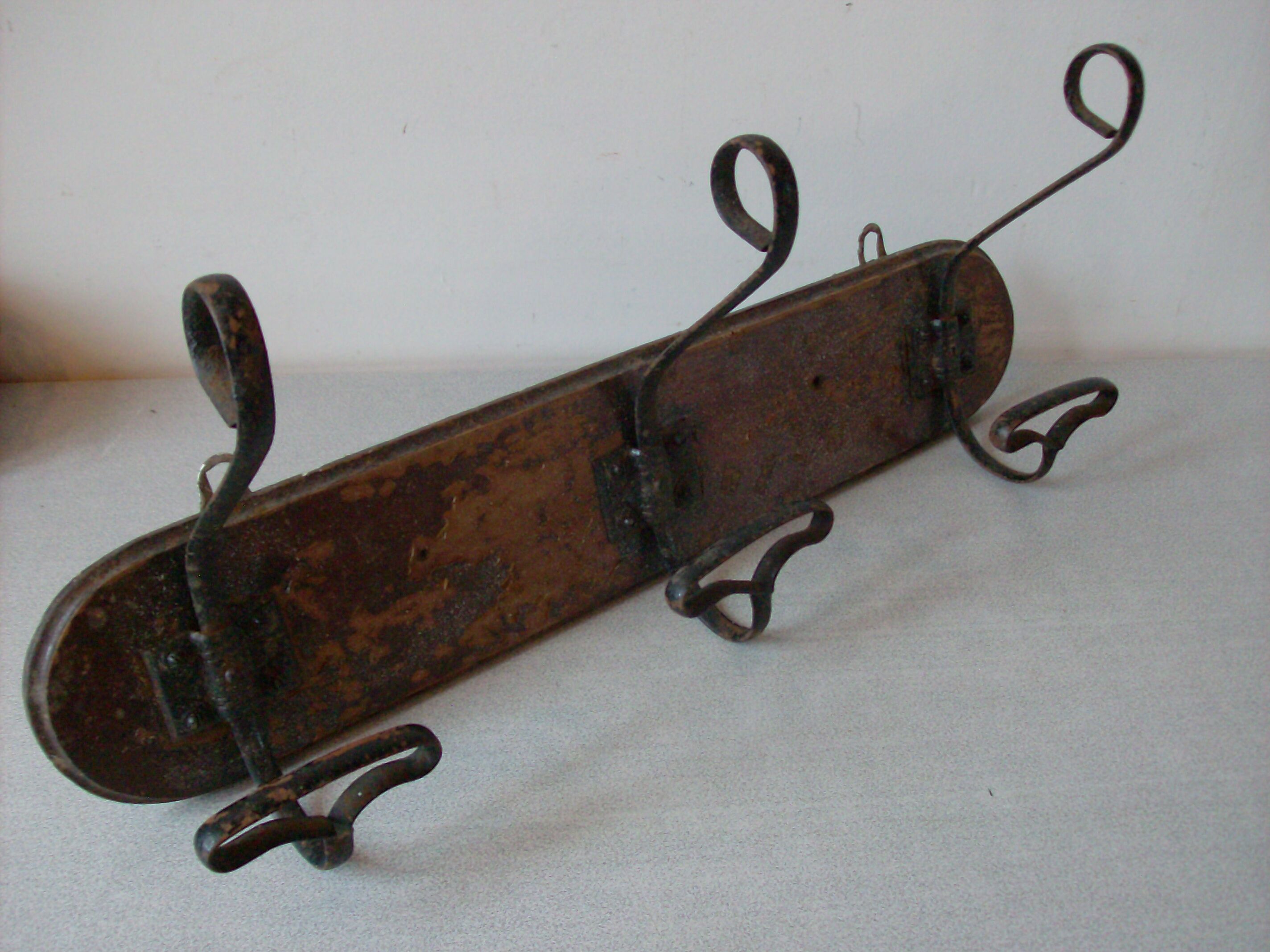 Old wall coat rack 3 metal hooks on wood deco retro entrance hall