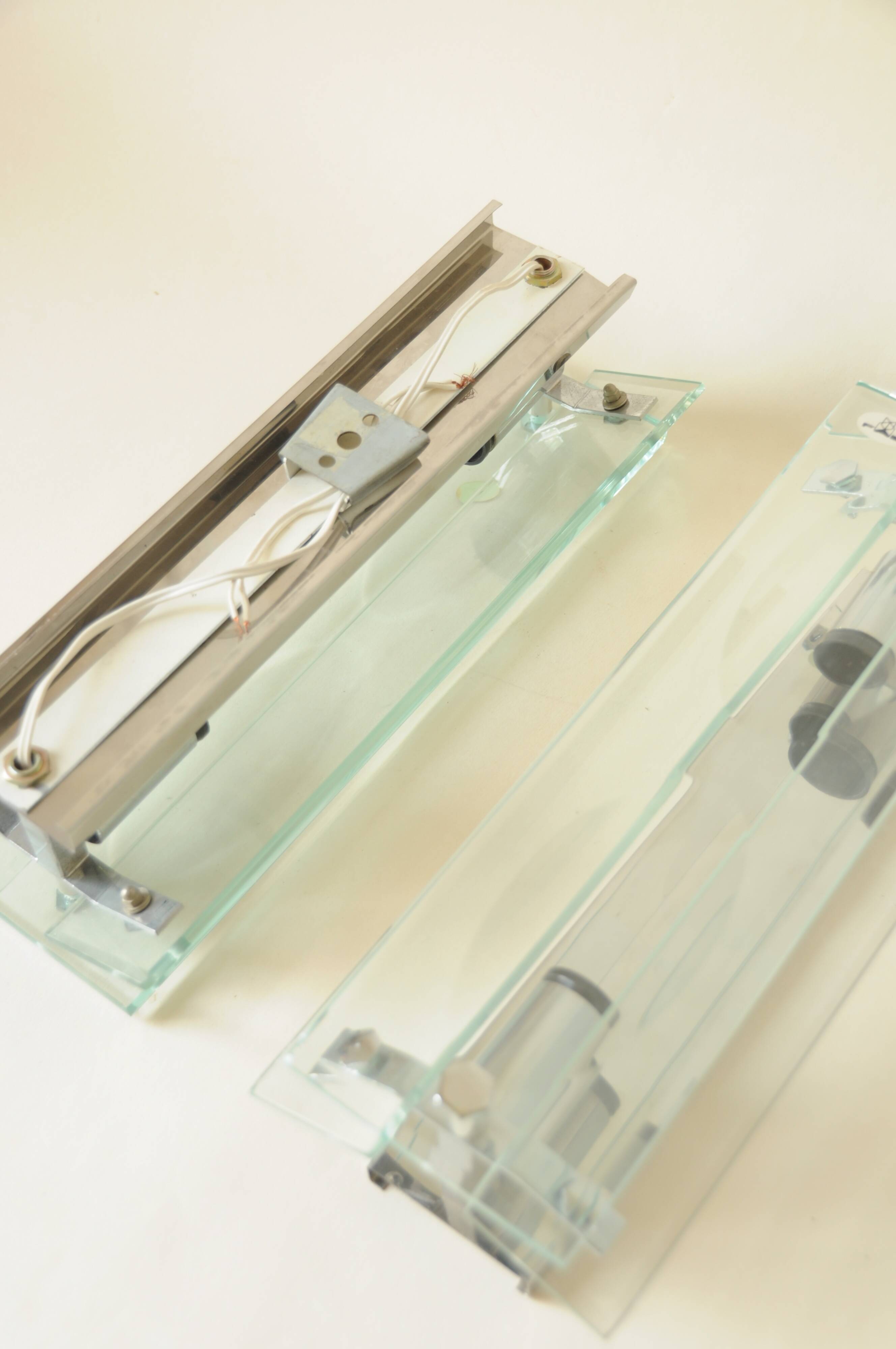 Pair of vintage glass and chrome wall sconces