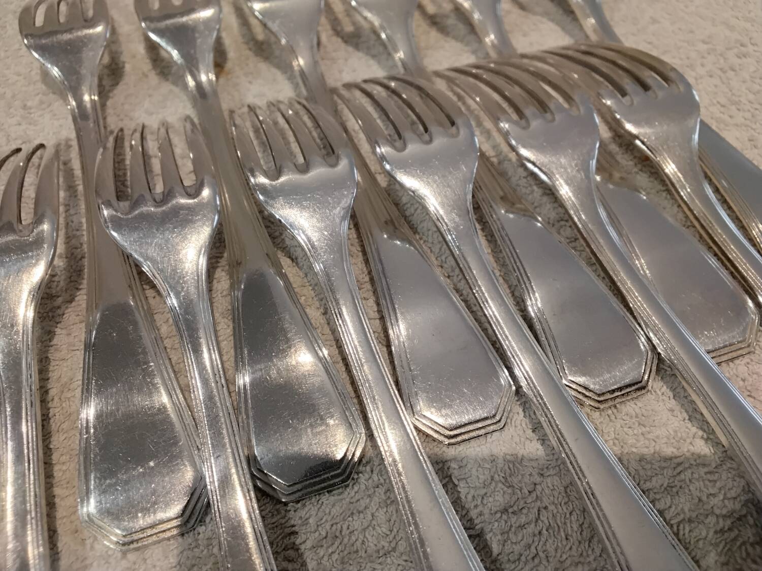 12 silver-plated table forks by Christofle America