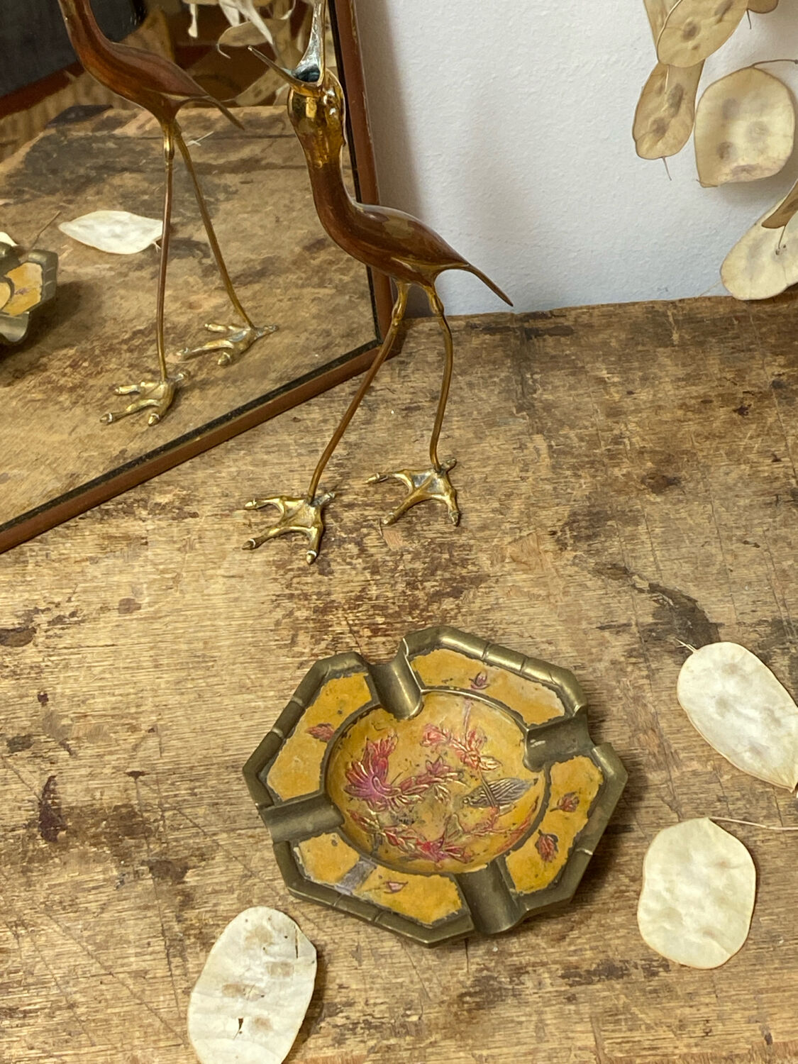 Enameled brass ashtray with floral decoration