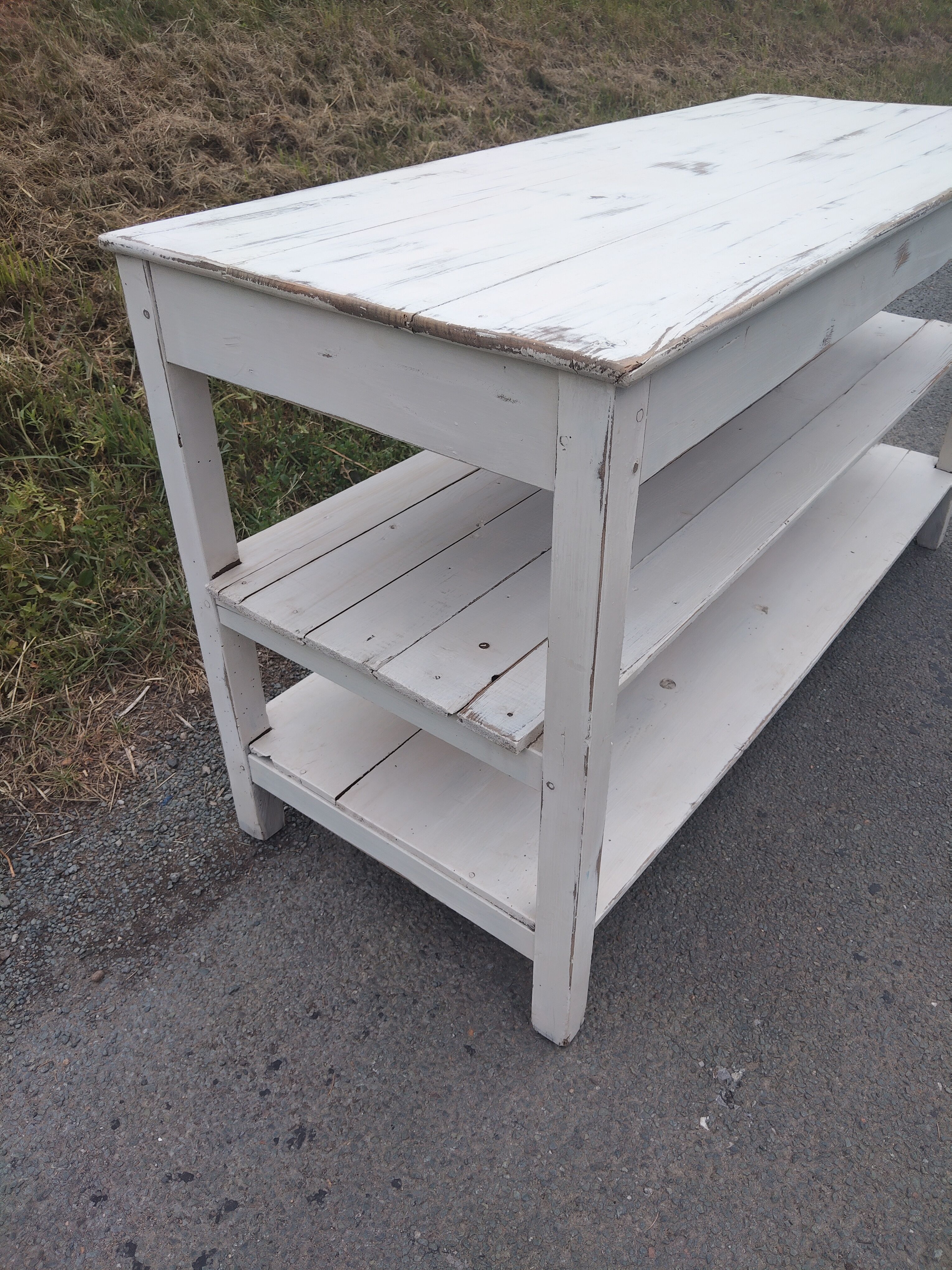 Antique white patinated draper's table, florist's wooden console.