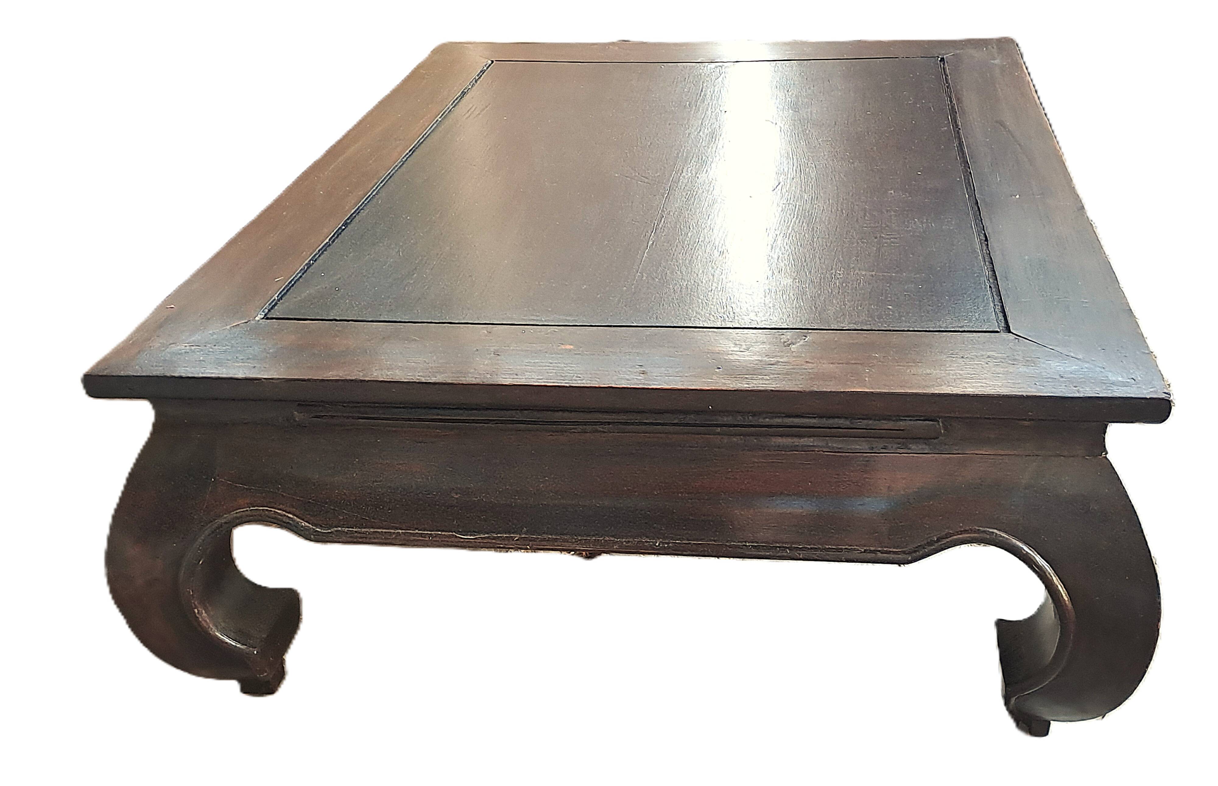 Rectangular coffee table made of exotic solid wood from the 1980s.