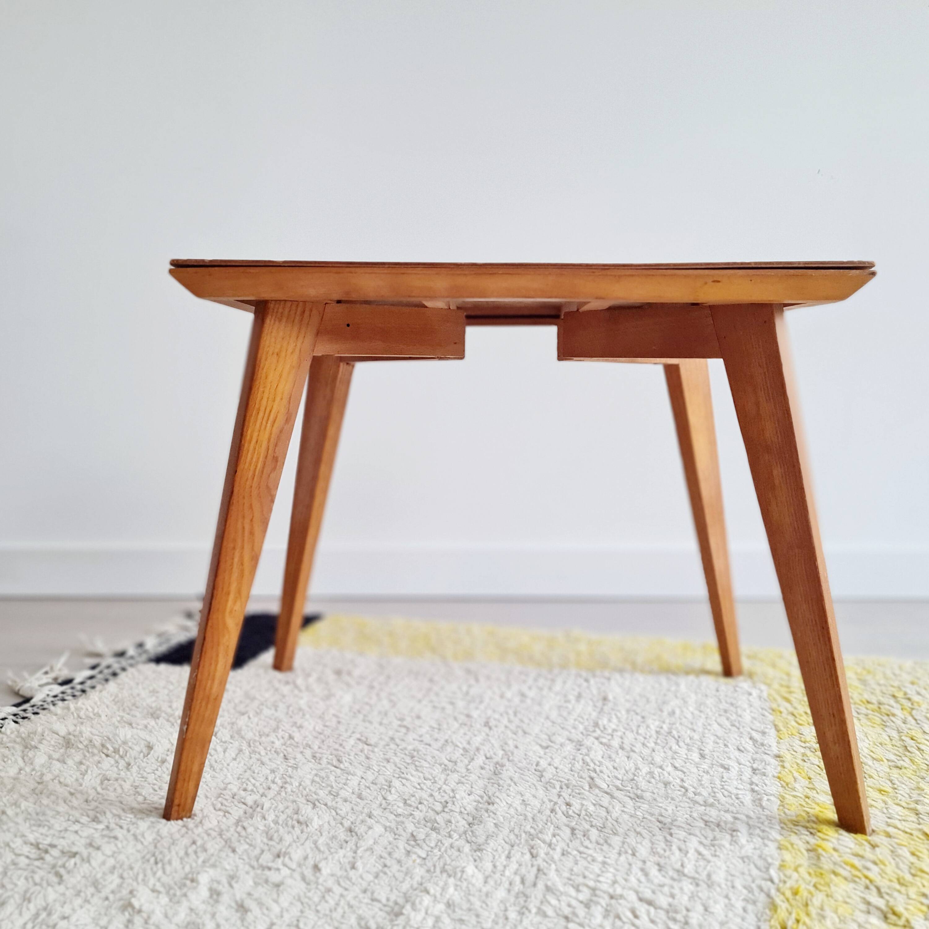 Table basse pieds compas dessus marqueté