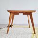 Table basse pieds compas dessus marqueté