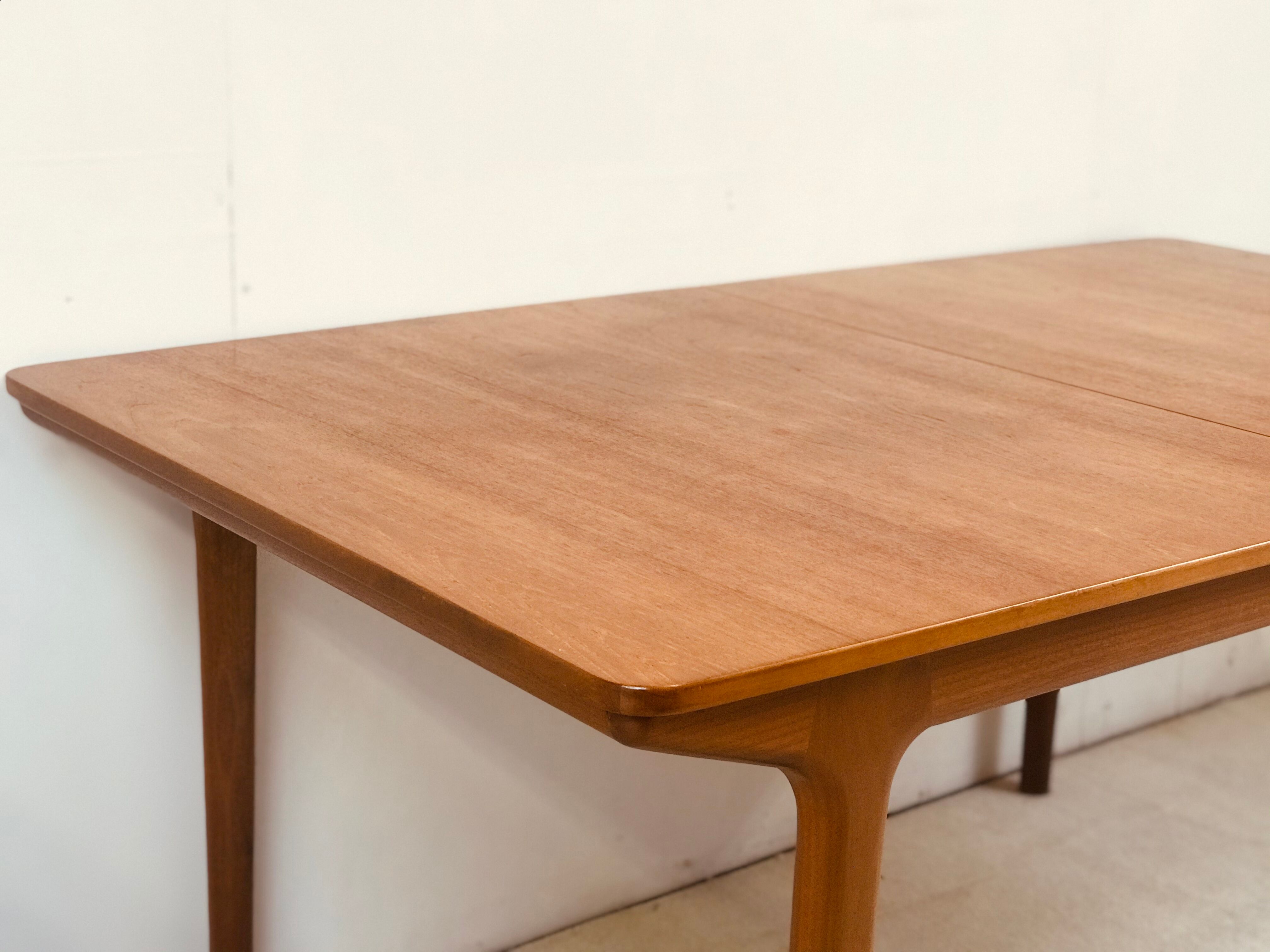 McIntosh extending teak table designed by Tom Robertson 60’s