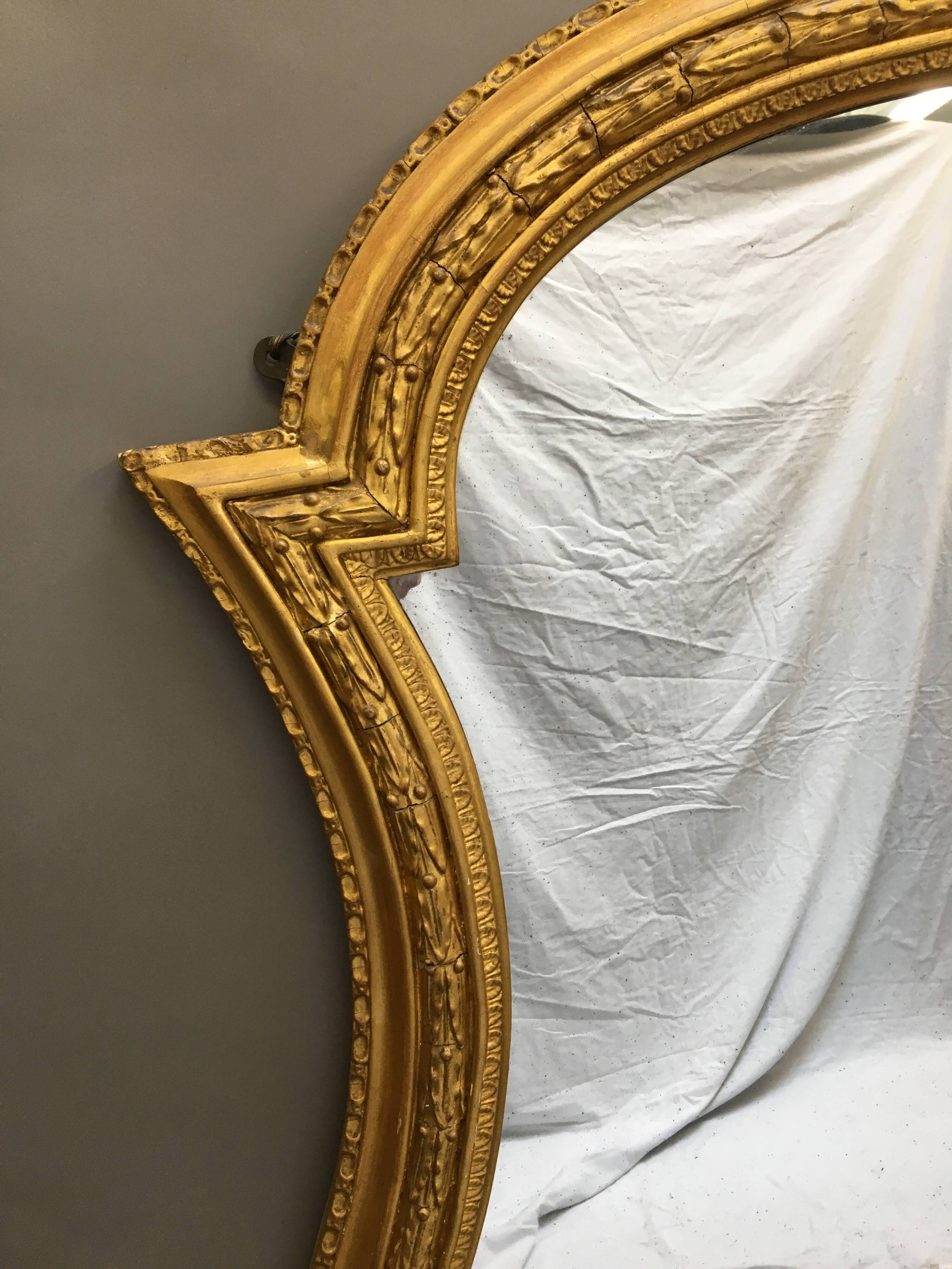 Grand miroir doré du 19ème