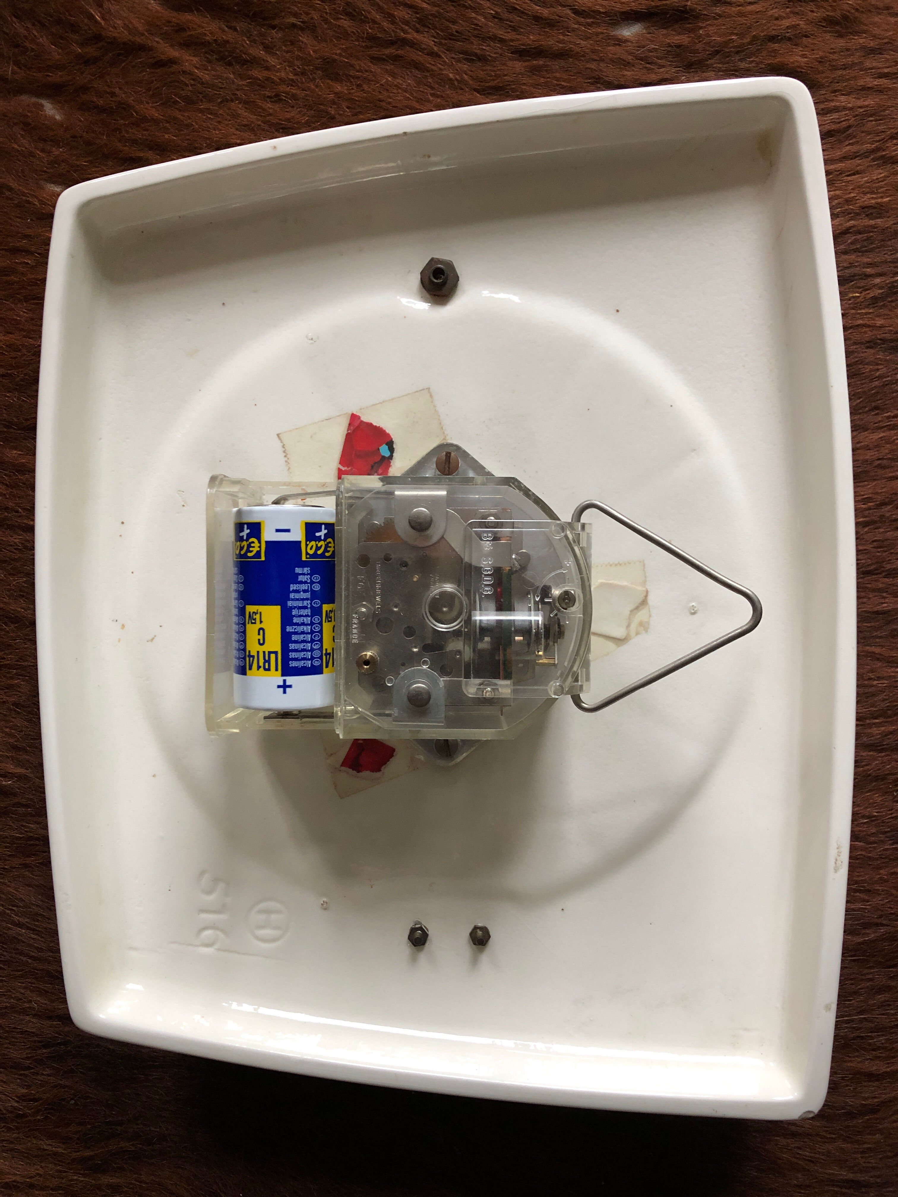 Ceramic trapeze clock of the 50s