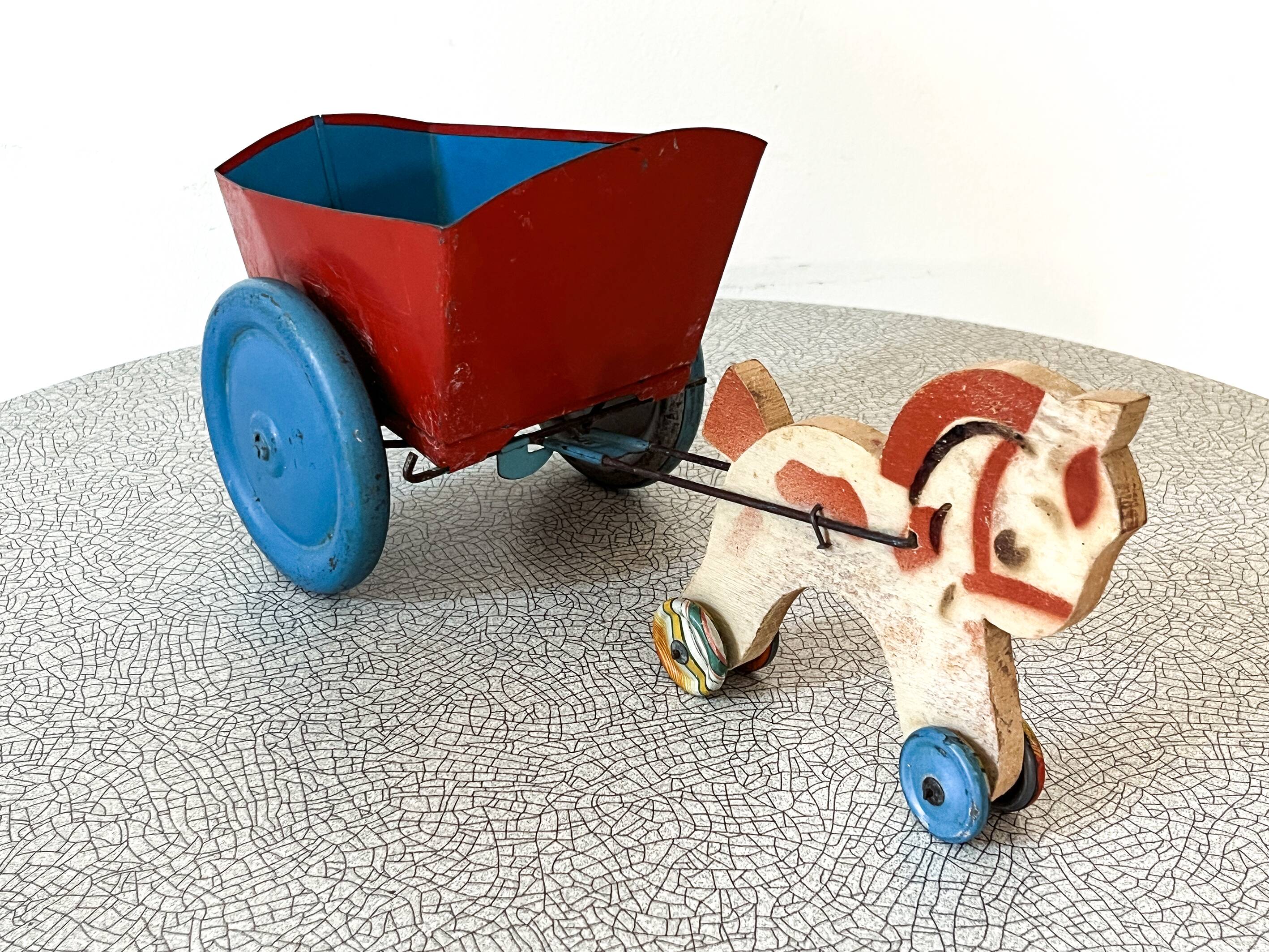 Horse cart and tin cart, old pull toy.