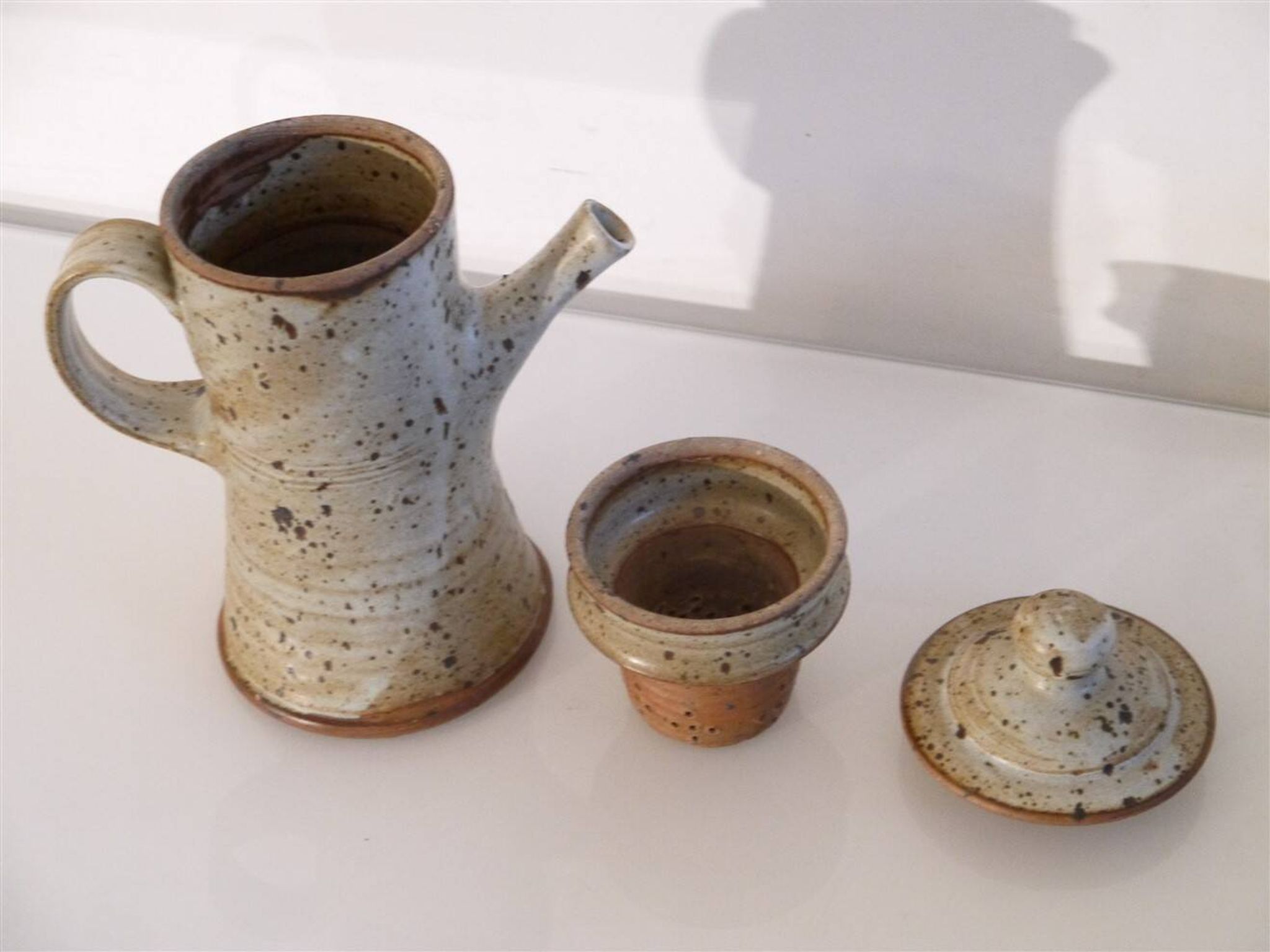 Teapot or stoneware coffee pot by Gustave Tiffoche.