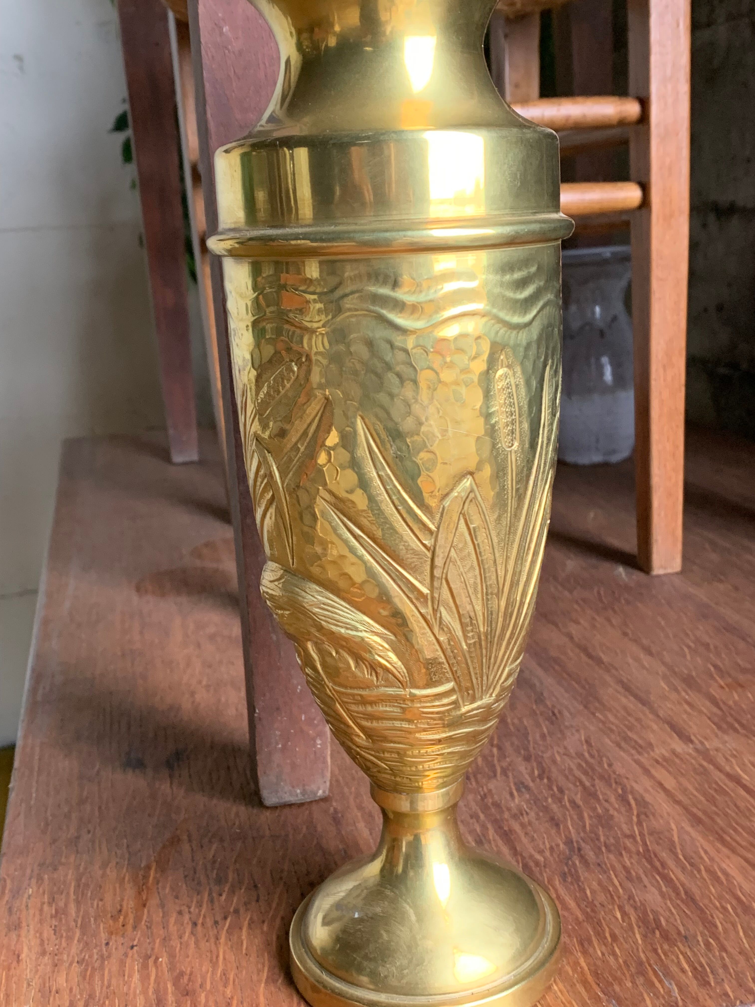 Brass vase with crane decoration