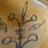 Old glazed terracotta dish