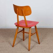Red chair produced by Ton in the 1960s