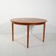 Round extendable teak table by Svante Skogh