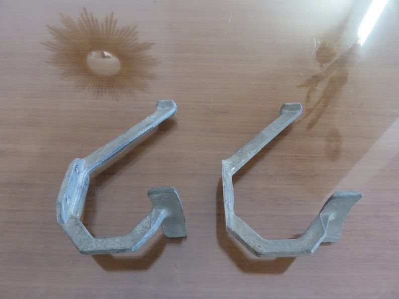 Pair of aluminum coat racks 30 years 40