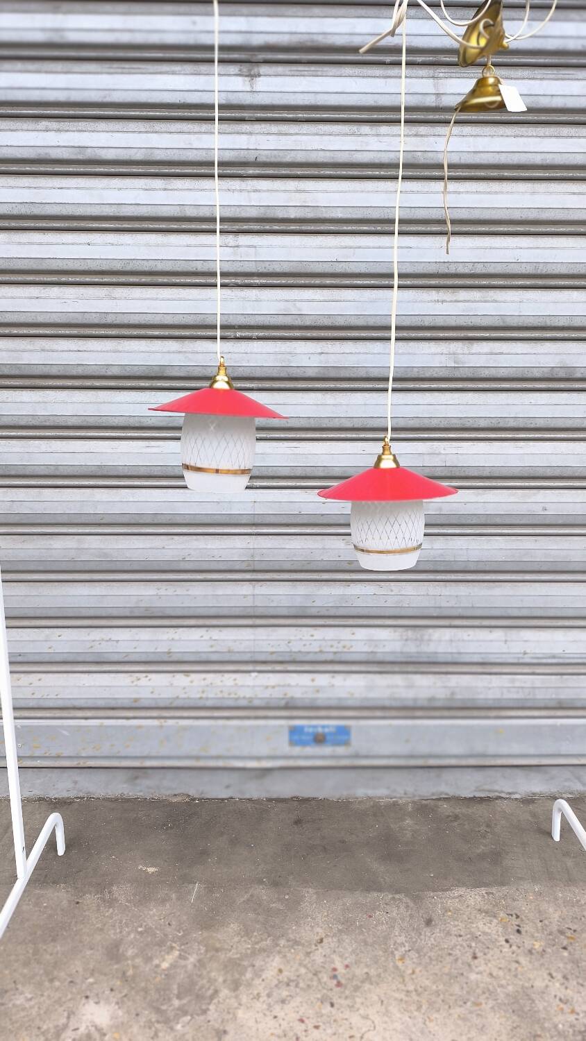 Pair of enamelled sheet metal and glass pendant lights