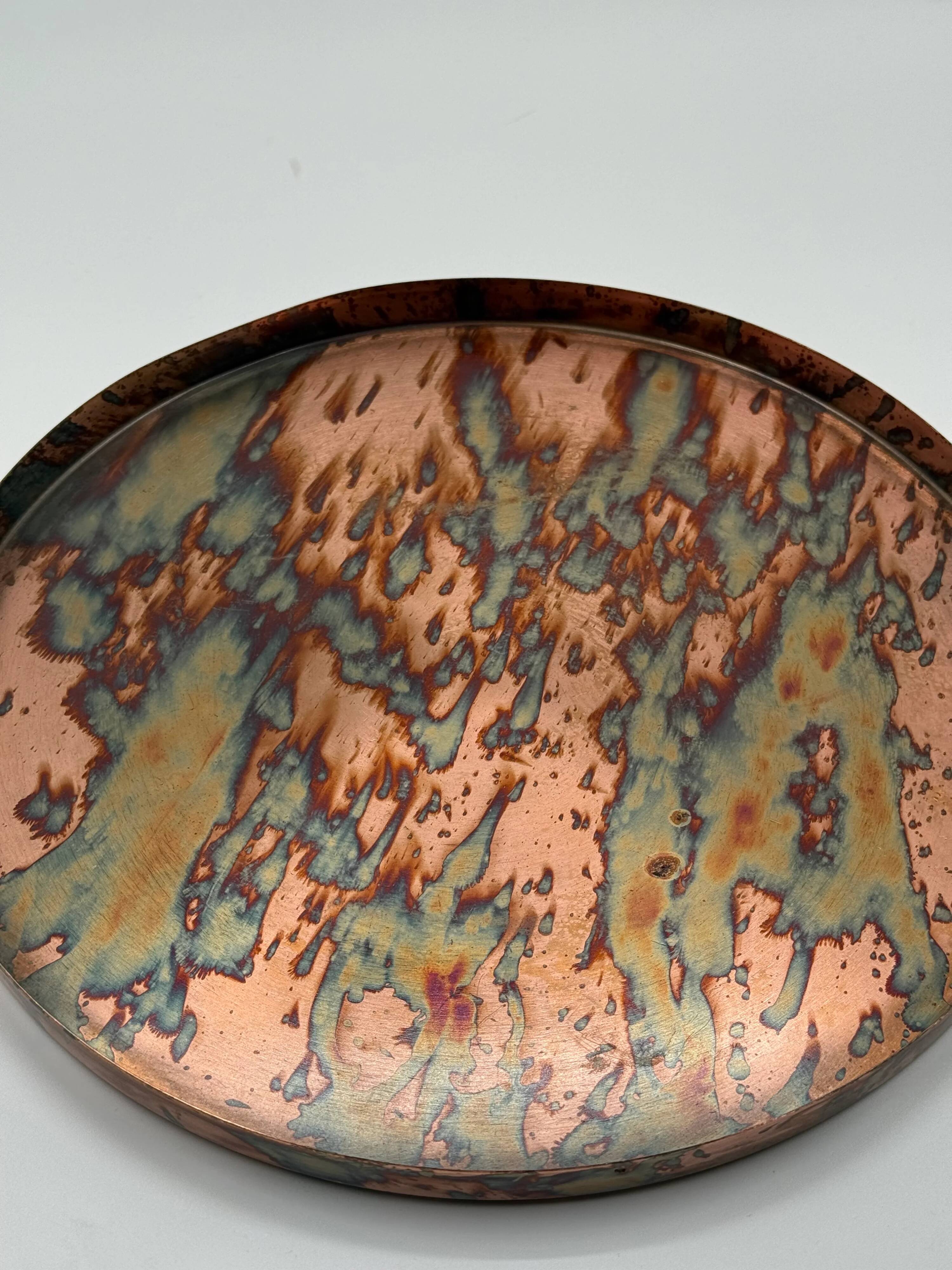 Round patinated copper platter, textured finish