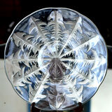 Dish by René Lalique, model "Dandelions", in patinated glass