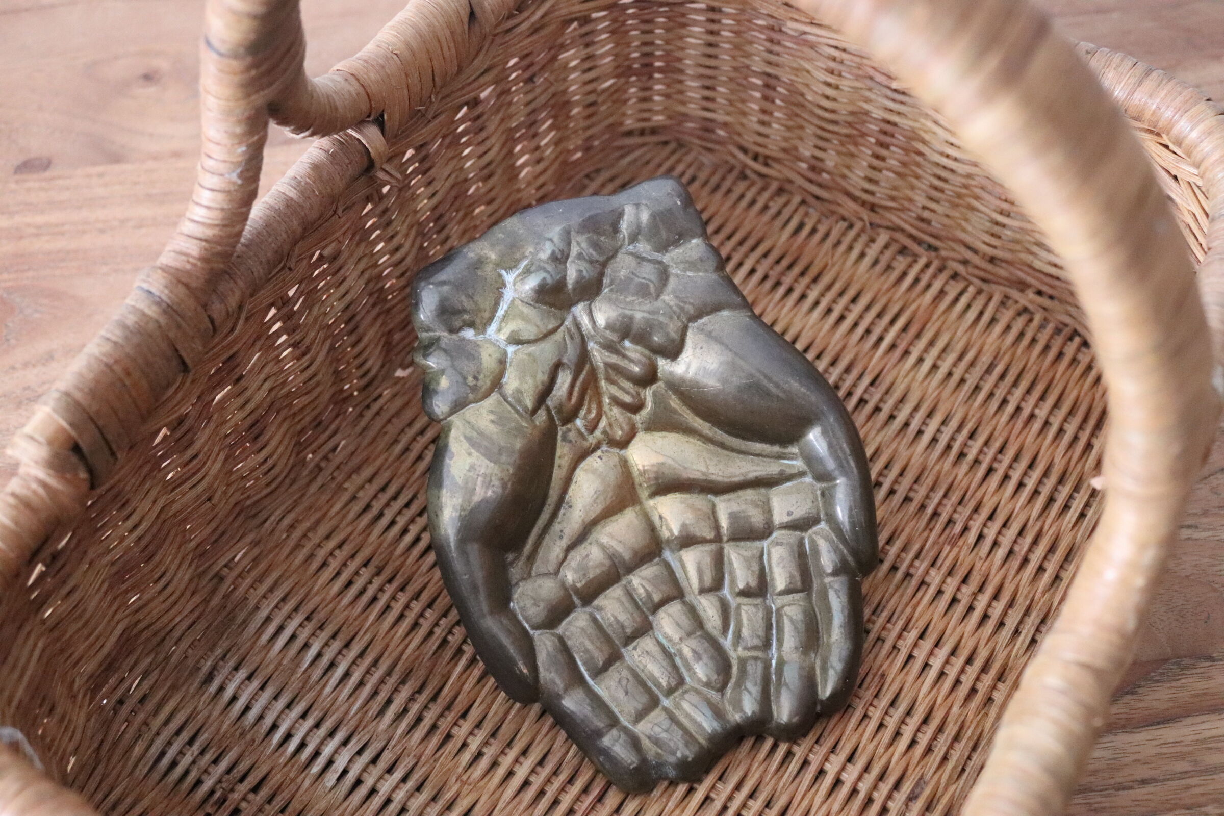 Empty pocket pair hand lucky charm brass