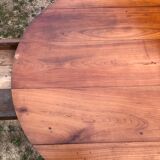 Louis Philippe oval shuttered table in solid cherry wood with 2 drawers.