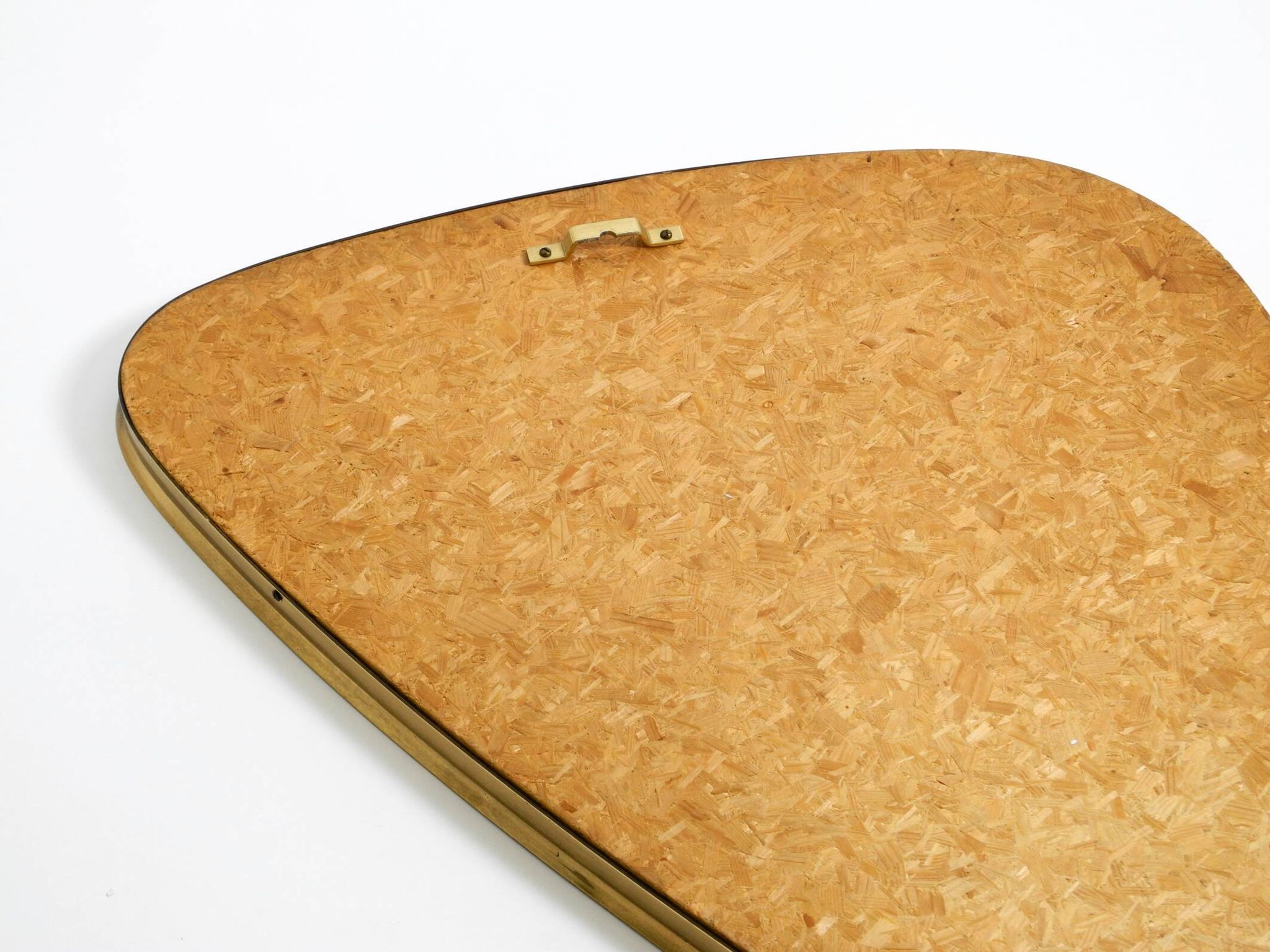 Heavy mid-century brass kidney-shaped wall mirror from Münchner Zierspiegel
