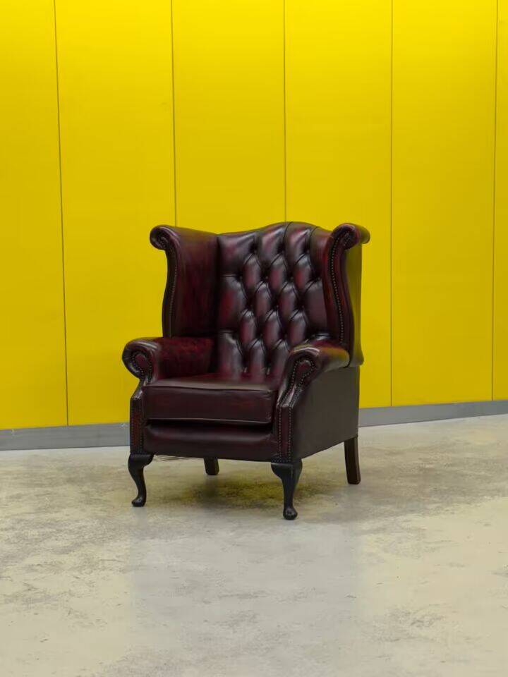 Burgundy leather chesterfield wing chair (Price is for one)