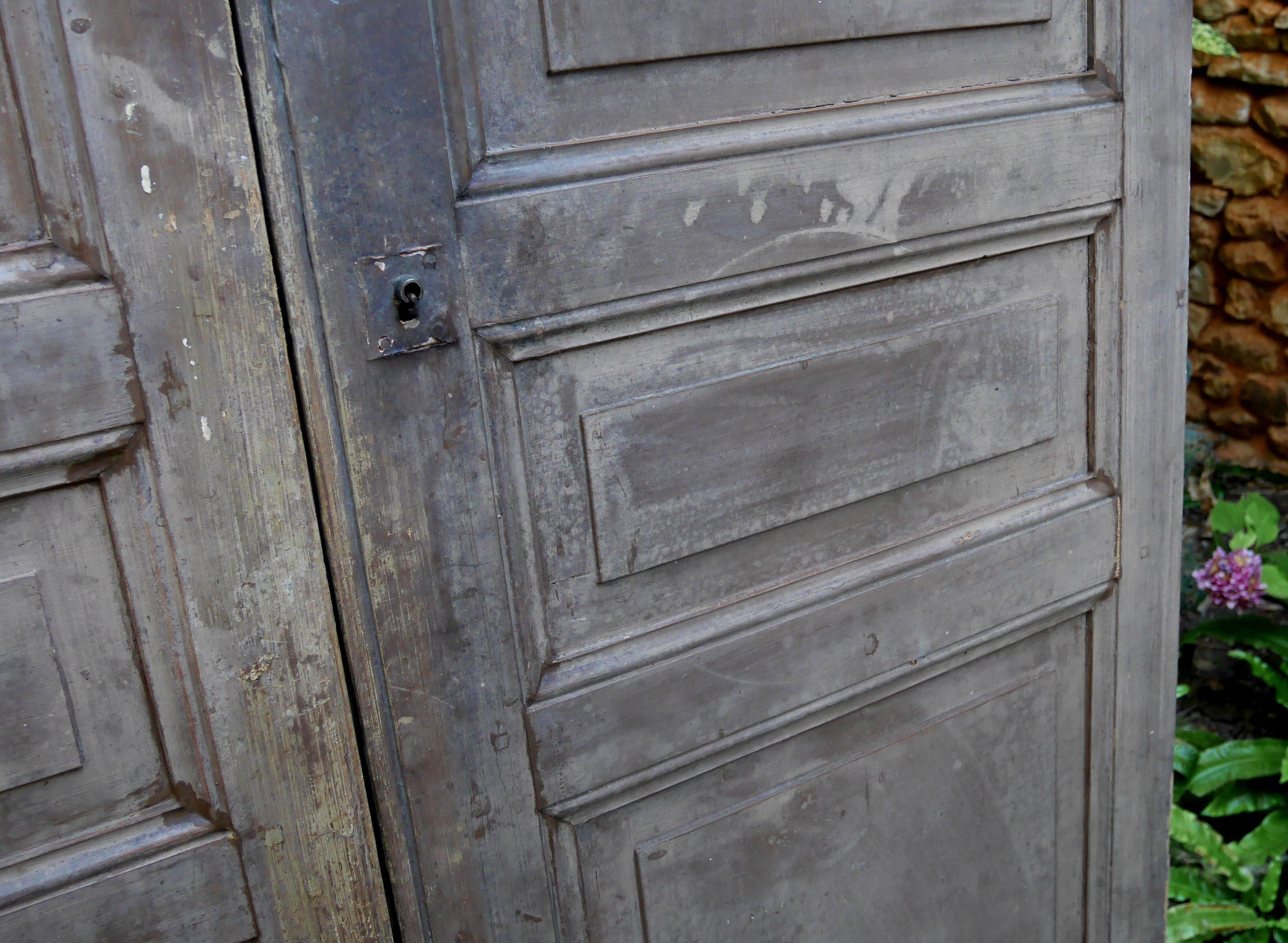 pair of large old wooden doors