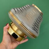 Vintage Art Deco globe wall/ceiling light in white, black, and gold glass.