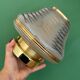 Vintage Art Deco globe wall/ceiling light in white, black, and gold glass.