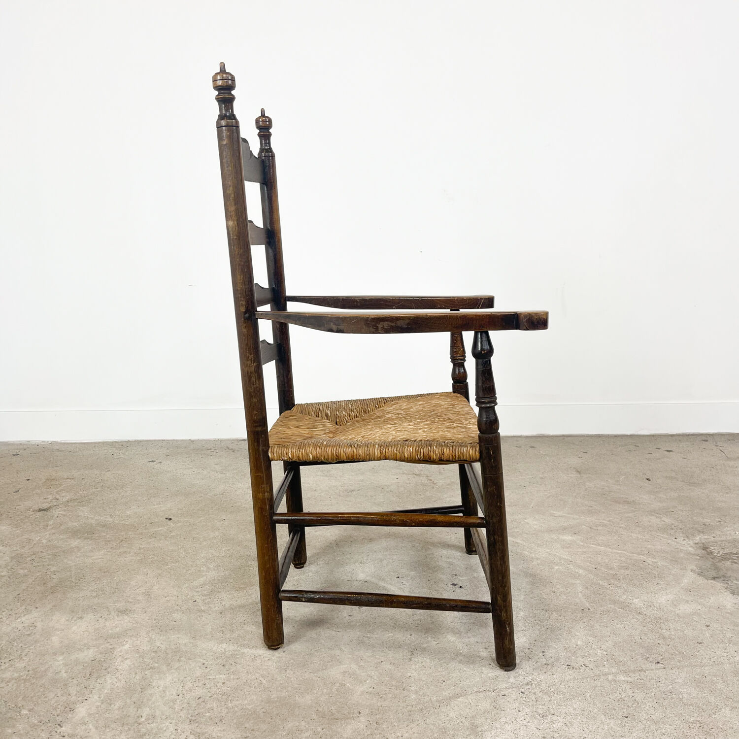 Antique oak wooden farmhouse armchair with cane seat Zutphen