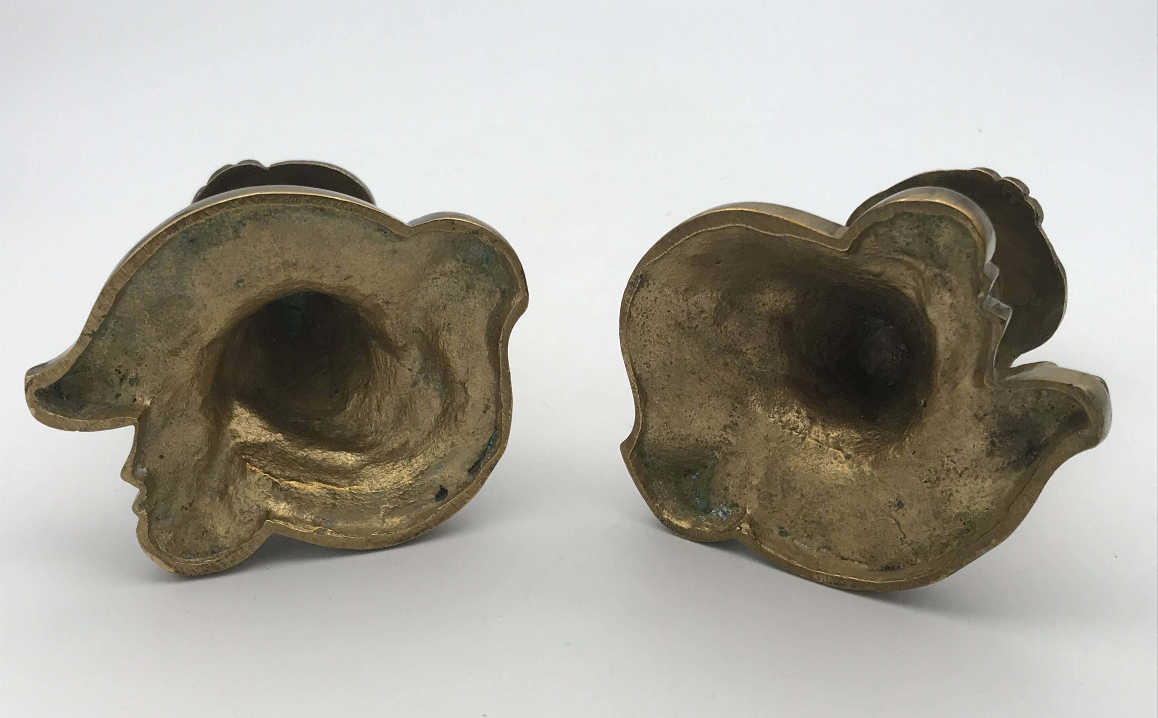 Pair of gilded bronze candlesticks with twisted decor and floral garlands, louis xv style