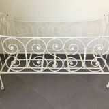 White wrought iron folding bed