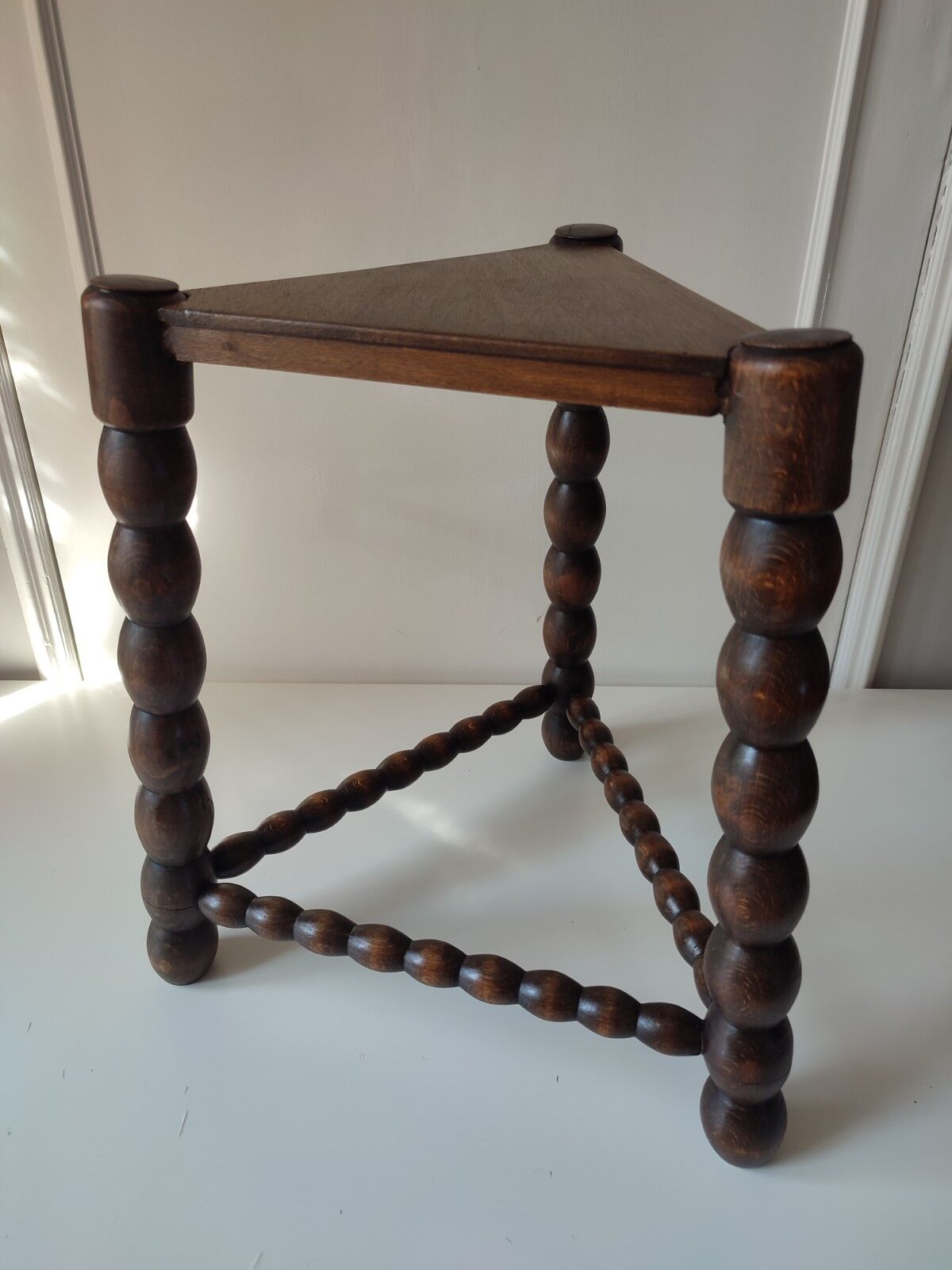 Wood tripod sofa end