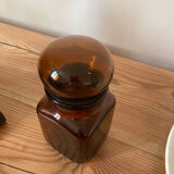 Old apothecary bottle in brown glass / jar