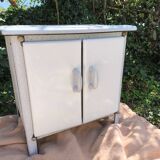 Small white and speckled gray industrial style enameled piece of furniture