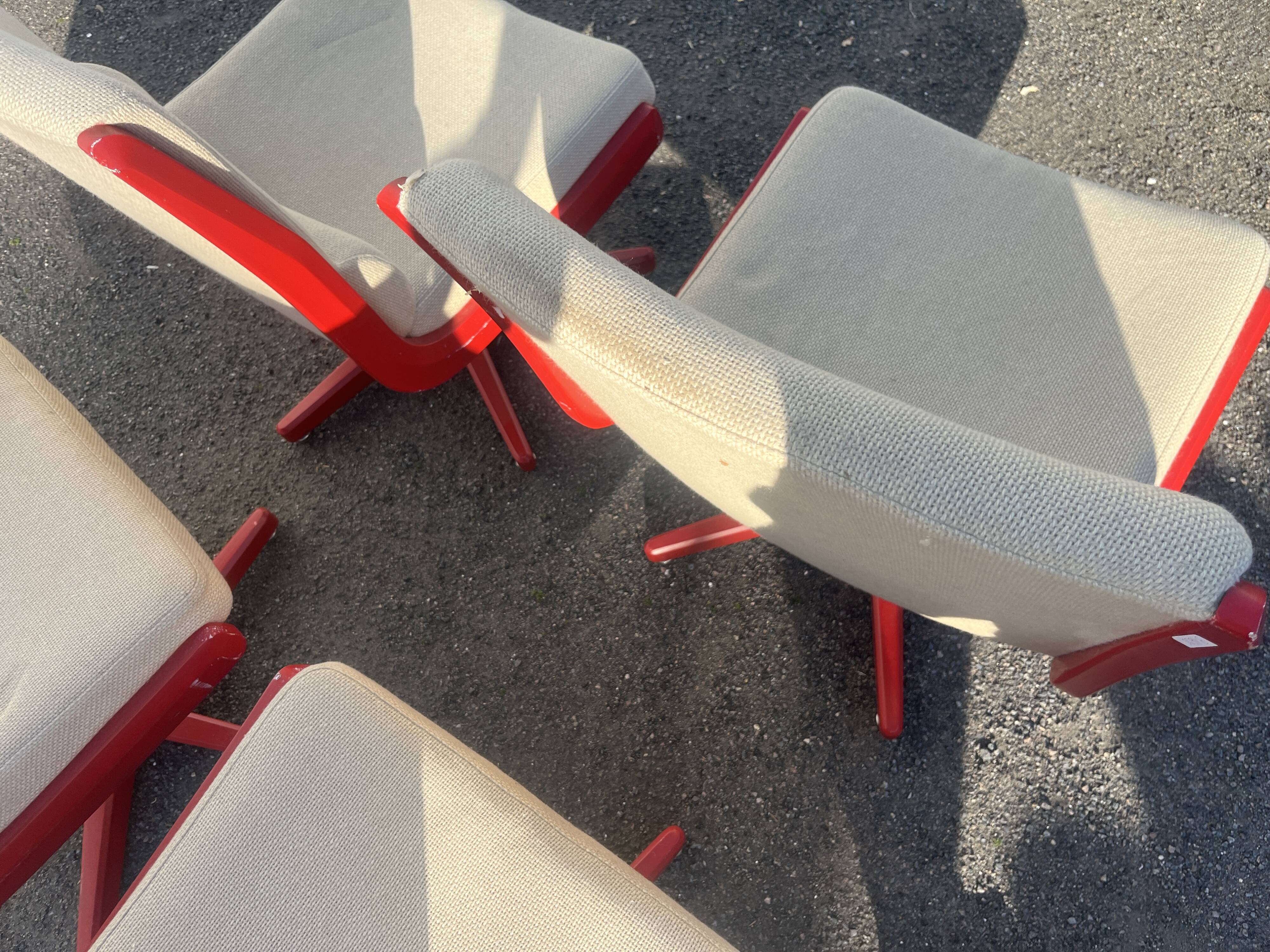 Set of 4 vintage 1970s swivel chairs in red and beige.