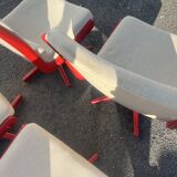 Set of 4 vintage 1970s swivel chairs in red and beige.