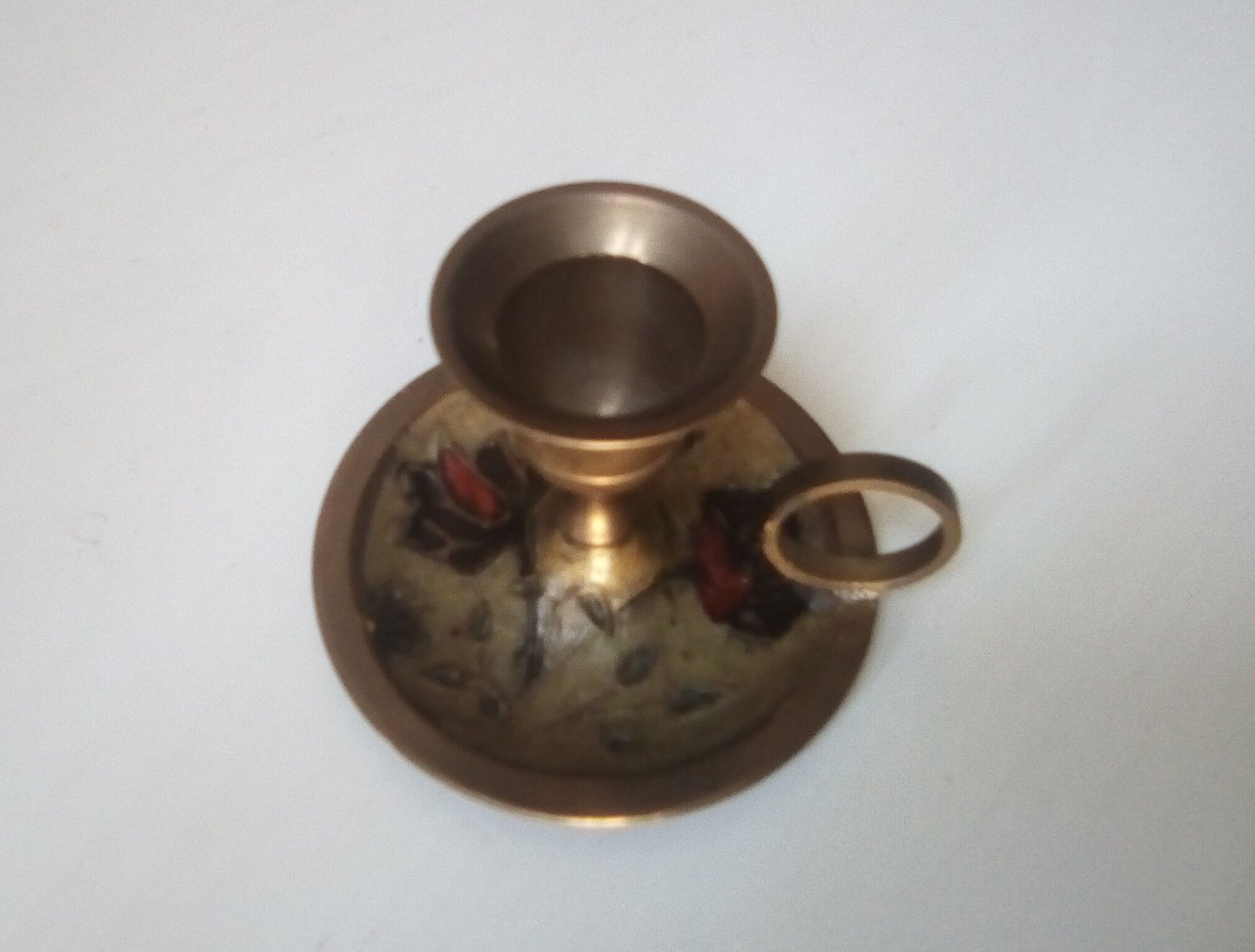 Vintage candlestick in brass cellar rat