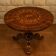 Round "Sorrentino" gueridon inlaid with a rosette design.