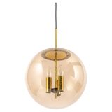 Large Limburg pendant light in brass with smoked glass ball, Germany, 1970s.
